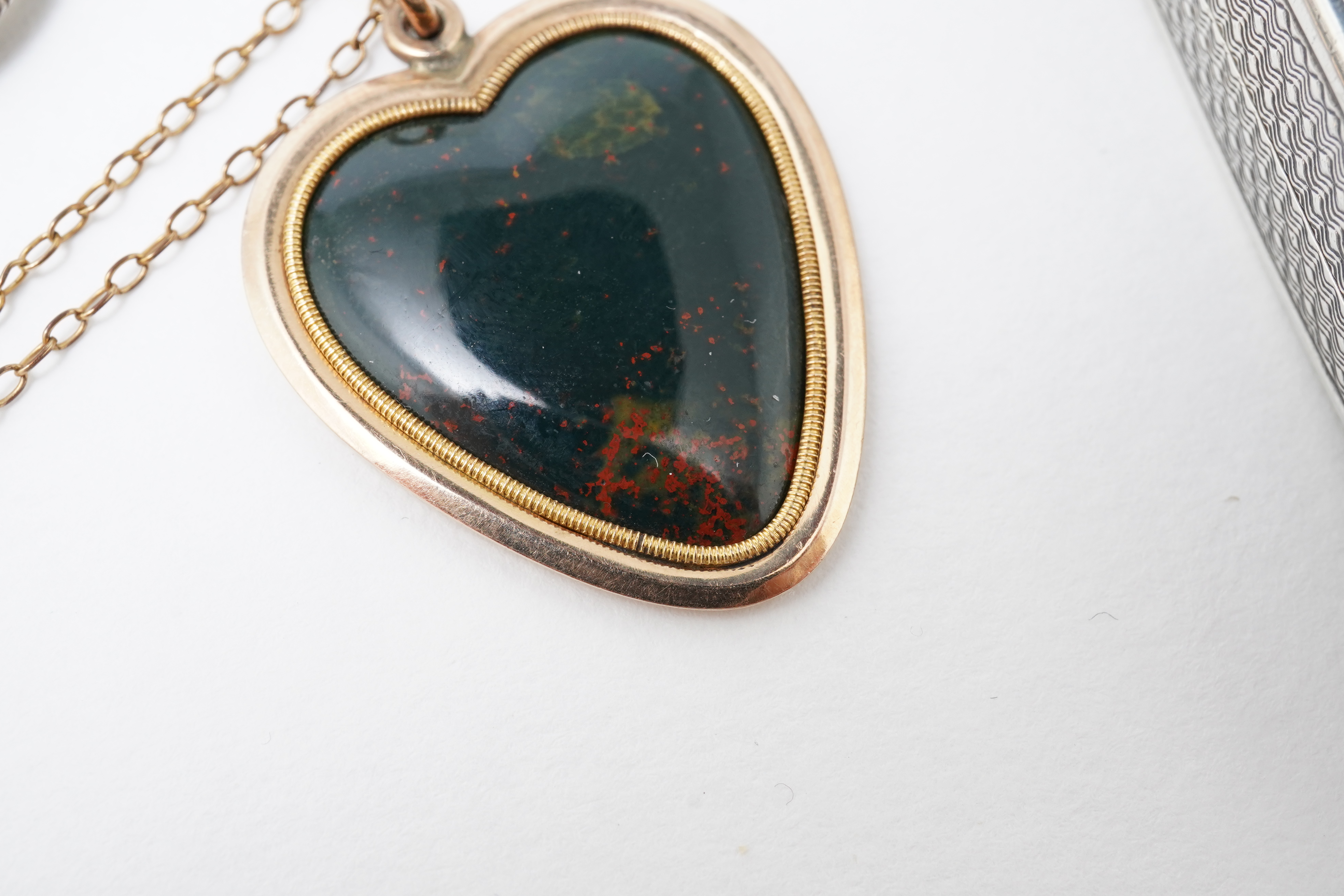 A collection of jewels and accessories including a moonstone bracelet